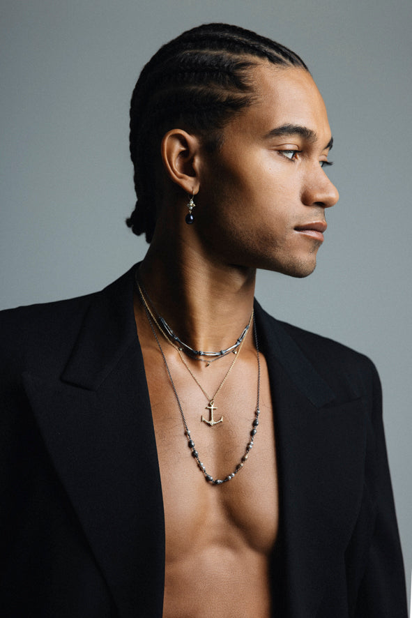 Milagros - necklace - silver arm bones and gold hearts