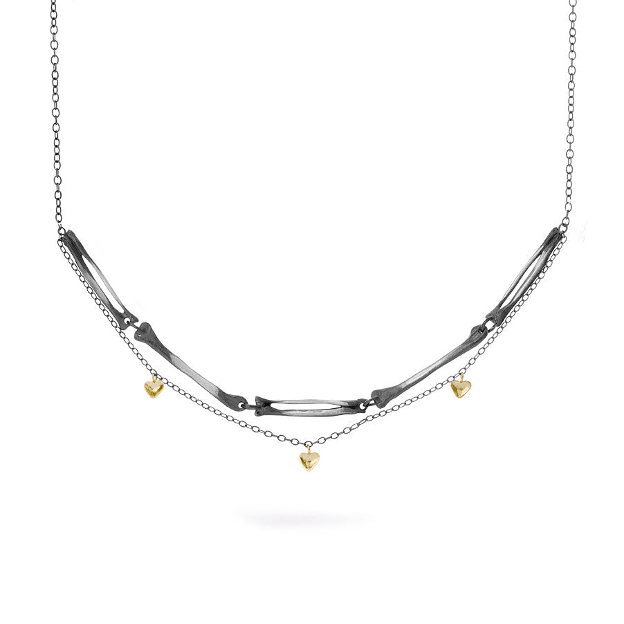 Milagros - necklace - silver arm bones and gold hearts
