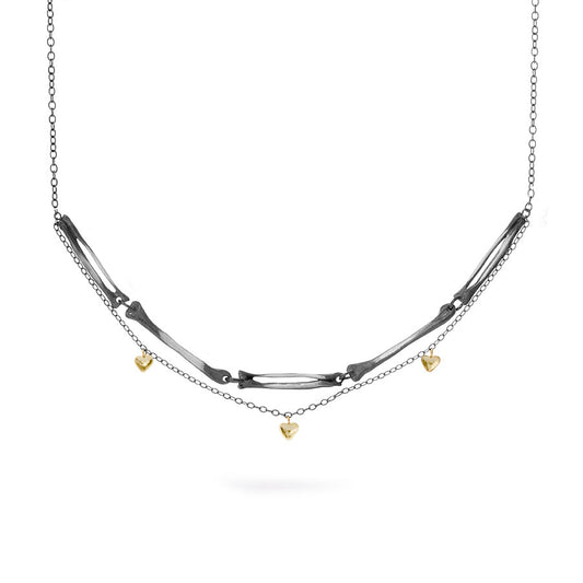 Milagros - necklace - silver arm bones and gold hearts
