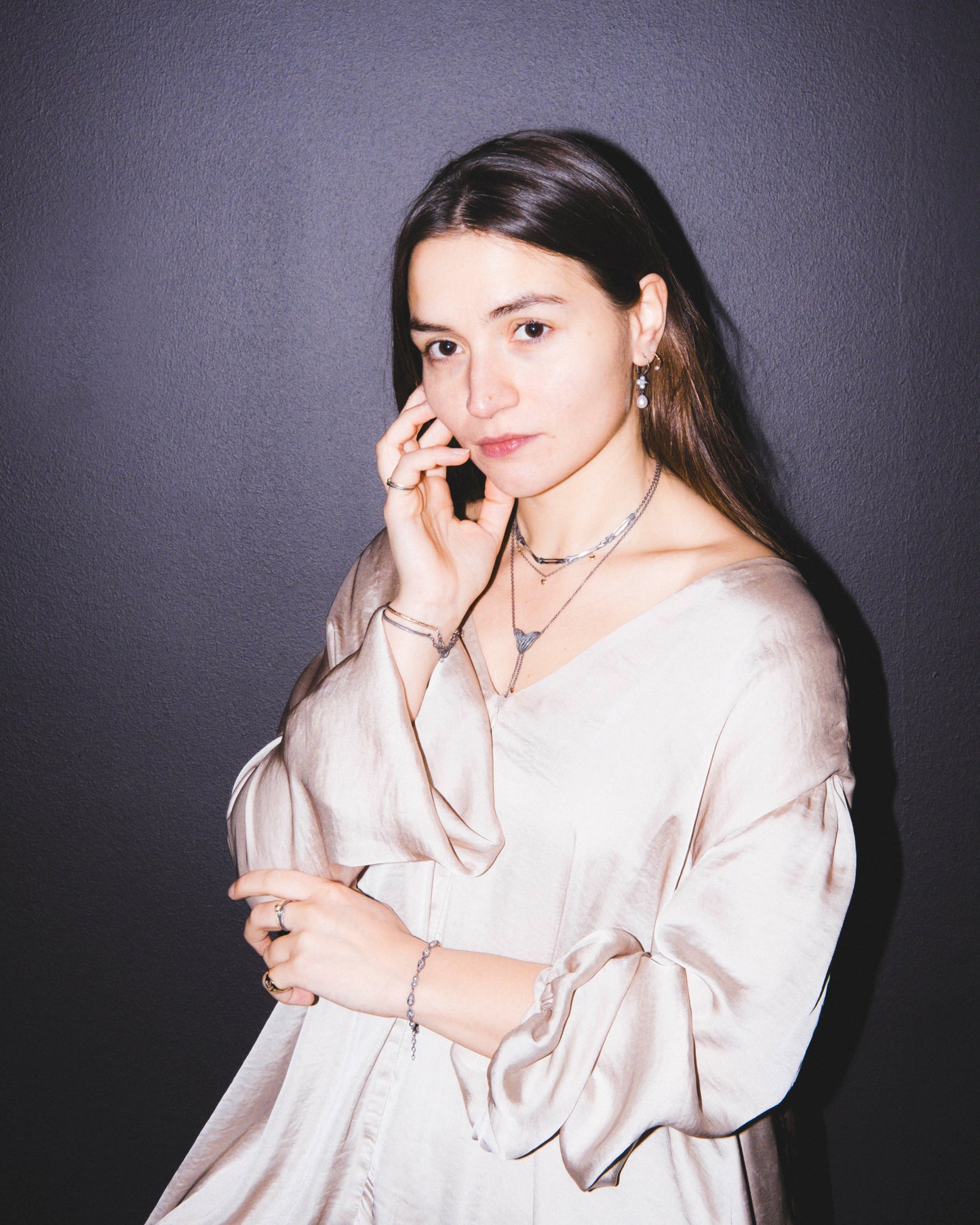 Milagros - necklace - silver arm bones and gold hearts